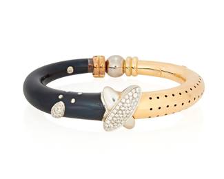 165
Nouvelle Bague: An 18K Bi-Color Gold, Silver, Enamel and Diamond Bangle
Featuring a white gold 'X' design set with round diamonds accented by rose gold and blue enamel, signed Nouvelle Bague, with Italian assay marks and workshop marks

Inner circumference: 6 1/2 in.
42.0 grams gross
Estimate: $2,200 - $2,800