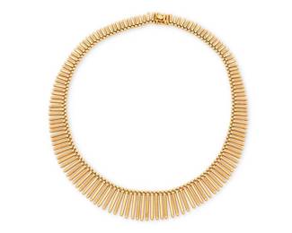 2
A 18K Gold Necklace
Featuring graduated fringe of high polish and textured gold, with Italian assay marks and workshop marks

Length: 15 1/2 in.
53.33 grams gross
Estimate: $4,000 - $6,000