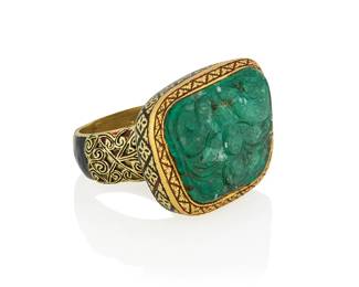50
A Mughal Style Gold, Emerald and Enamel Ring
Centering a large abstract-shaped carved emerald, set in a mount accented by floral and lattice work design black enamel

Size: 9, Top: 1 3/8 x 1 in.
34.5 grams gross
Estimate: $3,000 - $5,000