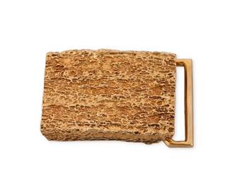 101
Ruser: A 14K Gold Belt Buckle
Of a textured gold design, signed Ruser

Measures: 1 1/2 x 1 in.
23.5 grams gross
Estimate: $1,000 - $2,000