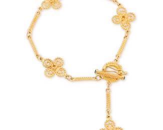 24
Roberto Coin: An 18K Gold Bracelet
Featuring four quatrefoil elements connected by fancy bar links, signed Roberto Coin with Italian assay marks

Length: 7 1/4 in.
10.5 grams gross
Estimate: $800 - $1,200