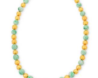 67
A Gold and Jade Necklace
Featuring twenty-one carved jade beads, accented by round 18k gold beads featuring gold granulation motifs, finished with a 14k gold and seed pearl clasp

Length: 28 in.
187.8 grams gross
Estimate: $7,000 - $10,000
