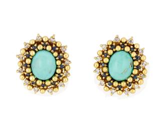 181
A Pair of 18K Gold, Turquoise, Sapphire and Diamond Earclips
Centering oval turquoise cabochons, encircled by round sapphires and single-cut diamonds
2 pieces

Measures: 1 x 7/8 in.
21.0 grams gross
Estimate: $1,200 - $1,800
