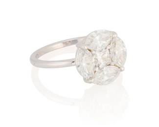 205
An 18K White Gold and Diamond Ring
Centering a princess-cut diamond weighing approximately princess 0.41 carat, encircled by four marquise diamonds weighing approximately 2.09 carats

Size: 7 1/4
3.64 grams gross
Estimate: $2,500 - $3,500