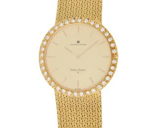 278
Universal Geneve: An 18K Gold and Diamond Watch
Dial: 30.00 mm, round dial with baton hour markers, encircled by round diamonds weighing approximately 0.64 carat
Model: Golden Shadow
Case: 35.00 mm
Case number: 31226
Closure: woven gold bracelet with jewelry clasp
Signed: dial and clasp

Inner circumference: 7 1/2 in.
65.4 grams gross
Estimate: $2,000 - $3,000