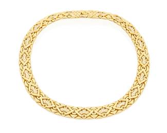120
Bulgari: An 18K Gold and Diamond Collar Necklace
Of an interlocking design accented by round diamonds weighing approximately 3.05 carats, signed Bulgari, Italy

Length: 17 in.
190.3 grams gross
Estimate: $15,000 - $20,000