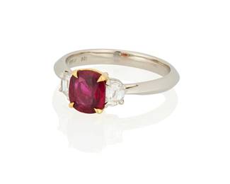 251
A Platinum, 18K Gold, Ruby and Diamond Ring
Centering a cushion brilliant-cut ruby weighing approximately 1.30 carats, accented by two half-moon diamonds, signed Tiffany & Co., with signed box

Size: 7 1/4 in.
5.67 grams gross

Accompanied by a GIA Report numbered #2235346023, dated March 13, 2025, stating the Ruby is natural Corundum with heat treatment.
Estimate: $4,000 - $6,000