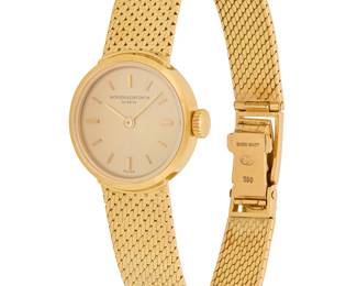 280
Vacheron Constantin: An 18K Gold Watch
Dial: 16.19 mm, round with stick hour markers
Model: 6663, 546714
Case:17.80 mm
Case number: 406003
Closure: with an 18k gold woven strap and clasp
Signed:dial, case and closure, with original paper and box

Inner circumference: 6 1/2 in.
27.8 grams gross
Estimate: $2,000 - $3,000