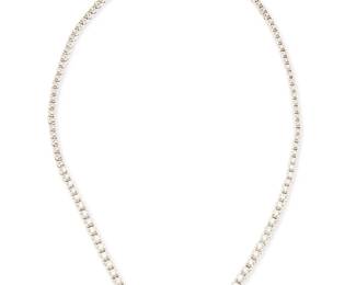 147
A 14K White Gold and Diamond Necklace
Featuring graduated round diamonds weighing approximately 3.50 carats

Length: 14 1/2 in.
26.3 grams gross
Estimate: $1,500 - $2,500