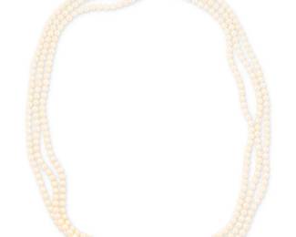 80
A 14K Gold, Cultured Peal and Gem-Set Necklace
Of a three-strand nested design featuring cultured pearls measuring approximately 5.40 mm, finished with a gold dragon motif clasp set with round emerald, rubies and diamonds

Length: 24-26 in.
83.4 grams gross
Estimate: $1,000 - $1,500