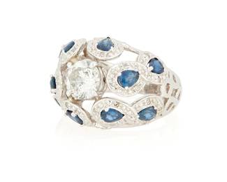 255
A 14K White Gold, Sapphire and Diamond Ring
Centering a round diamond weighing approximately 1.15 carats, accented by round diamonds and pear-shaped sapphires in an openwork design

Size: 6
9.5 grams gross
Estimate: $1,000 - $2,000