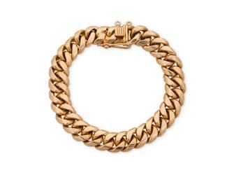 135
An 18k Gold Bracelet
Of a Cuban link design

Length: 7 3/4 in. Width: 1/2 in.
83. 4 grams gross
Estimate: $4,000 - $6,000