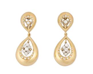 231
A Pair of Gold and Diamond Earrings
Of a two-tiered design set with round diamonds and suspending round diamonds weighing approximately 3.45 carats total
2 pieces

Measures: 2 1/4 x 7/8 in.
20.0 grams gross
Estimate: $2,500 - $3,500