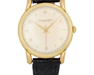290
International: An 18K Gold Watch
Dial:30.00 mm, round with mixed hour markers
Case: 35.00 mm
Closure: black leather clasp with gold-plated buckle clasp
Signed:dial

Inner circumference:7 - 8 1/2 in.
39.0 grams gross
Estimate: $2,000 - $3,000