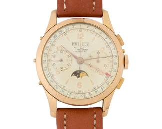 289
Breitling: A Rose Gold 'Datora' Watch
Dial: 35.00 mm, round with mixed hour markers and two subsidiary dials
Model: Datora B25
Case: 40.00 mm
Case number: 622710
Closure: brown leather strap with plated buckle clasp
Signed: dial, case

Inner circumference:8 - 9 1/4 in.
54.3 grams gross
Estimate: $7,000 - $9,000