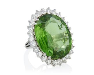 160
A Platinum, Peridot and Diamond Ring
Centering an oval peridot weighing approximately 63.40 carats, encircled by round diamonds weighing approximately 2.60 carats

Size: 4 1/2
17.6 grams gross
Estimate: $6,000 - $8,000