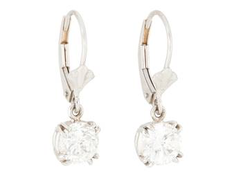 32
A Pair of White Gold and Diamond earrings
Featuring two round diamonds weighing approximately 0.90 carat each
2 pieces

Measures: 7/8 in.
2.38 grams gross

Center Diamond:
Approximate overall color and clarity: F-G, SI-I
Estimate: $1,500 - $2,500