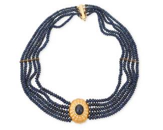 140
A Gold, Sapphire and Diamond Necklace
Featuring five strands of graduated sapphire beads measuring approximately 2.9 - 4.6 mm, centering a scalloped center element featuring an oval sapphire measuring approximately 11.67 x 9.52 x 6.50mm, encircled by round diamonds

Length: 14 in.
67.2 grams gross
Estimate: $3,000 - $5,000