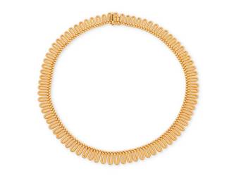 19
An 18K Gold Necklace
Featuring textured gold scalloped links, with Italian assay marks

Length: 16 1/2 in.
44.1 grams gross
Estimate: $2,000 - $3,000
