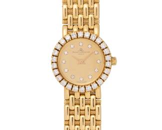 282
Baume & Mercier: An 18K Gold and Diamond Watch
Dial: 16.10 mm, round dial with diamond inset hour markers, encircled by round diamonds weighing approximately 1.04 carats
Model: 16651 9
Case: 21.50 mm
Case number: 2059890
Closure: gold link bracelet with jewelry clasp
Signed: dial and clasp

Inner circumference: 6 1/2 in.
47.3 grams gross
Estimate: $1,500 - $2,000
