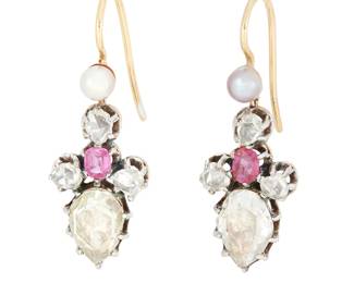 57
A Pair of Antique, 18K Gold, Silver, Diamond and Ruby Earrings
Centering pear-shaped rose-cut diamonds accented by rose-cut diamonds, cushion-cut rubies and seed pearls
2 pieces

Measures: 1 1/8 x 3/8 in.
3.8 grams gross
Estimate: $1,000 - $2,000