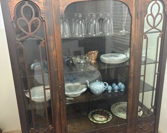 Antique China cabinet. Several vintage glasses, plates, etc.