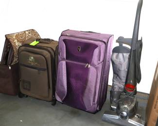 Luggage and vacuums (2)