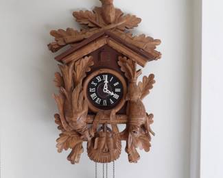 VINTAGE EMIL SCHMECKENBECHER HUNTING SCENE CUCKOO CLOCK (JAN 1970)  $250.  NEEDS TUNE UP.