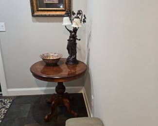 Inlaid coffee table 
Bronz statue o
Decorative bowl