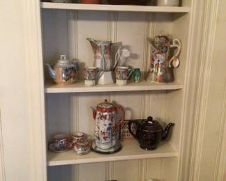 Collection of pitchers, teapots, chocolate sets
