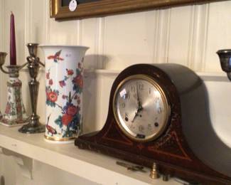 Head and shoulder mantle clock
