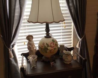 Antique lamp and bisque lady figurine