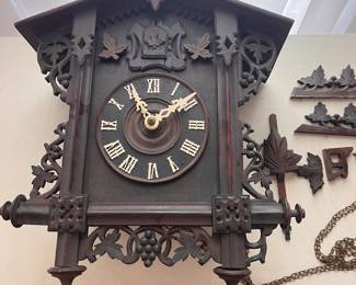 Vintage German Decorative Cuckoo Clock with Roman Numerals and Ornate Design