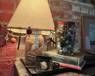 Vintage Glass Jar with Marbles, Books, and Lamp