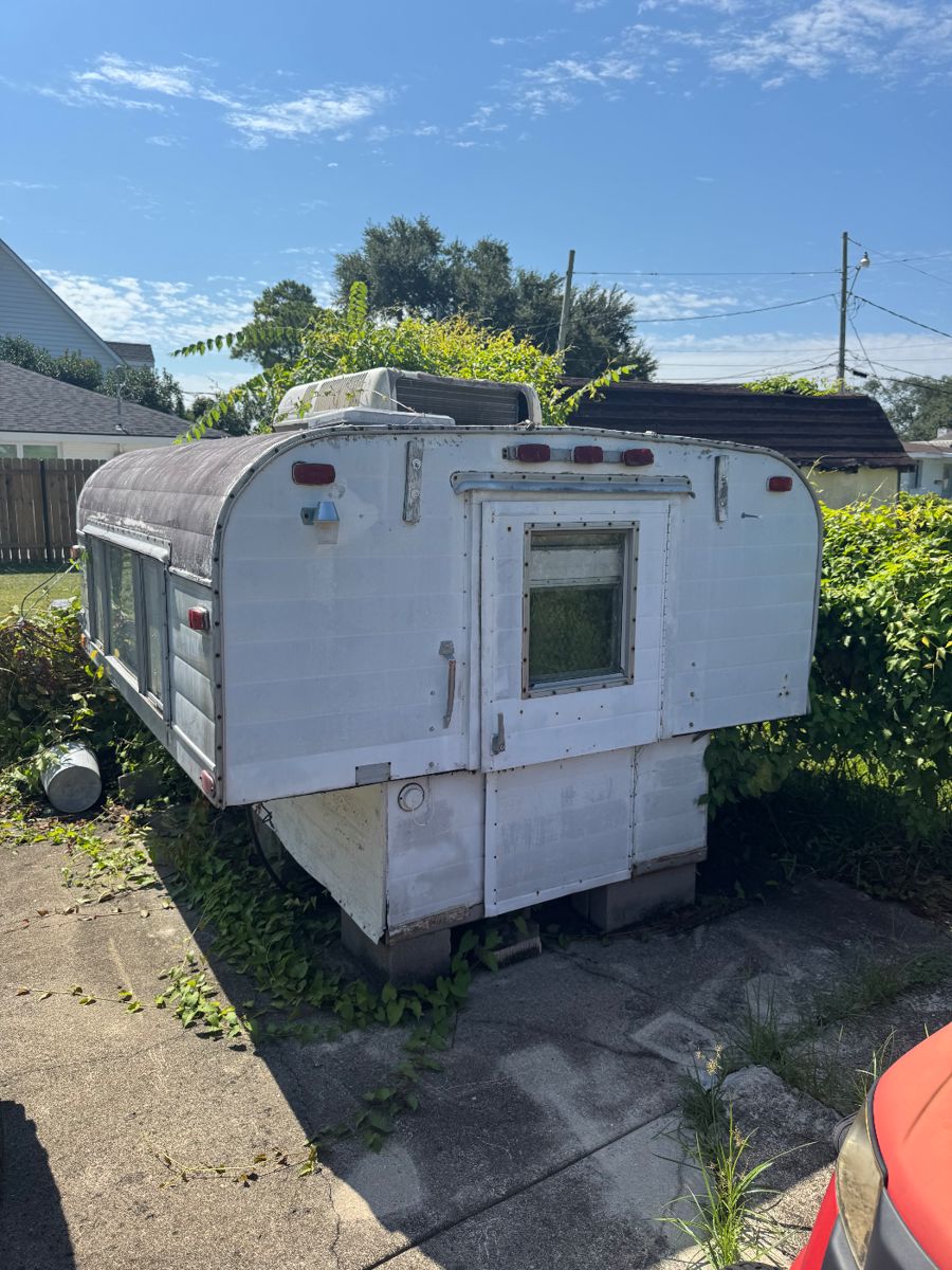 1960s Alaskan pop up truck bed camper