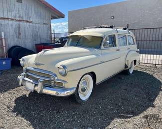 33 1950 Chevrolet DeLuxe Tin Woody Wagon