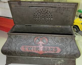 Antique tin Twin Oaks tobacco humidor.