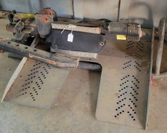 Motorized scooter/wheel chair automotive caddy.