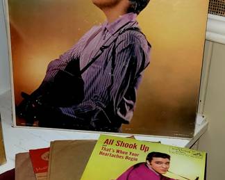 Early Elvis album and 45 records and an original Roy Orbison 45 on the Sun Records label.