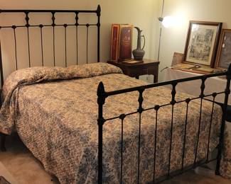 Beautiful and sturdy cast iron full-size bed.
