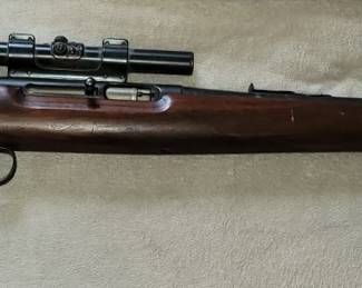 Remington 550-I .22 caliber rifle with scope. "BW" date mark.