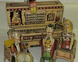 1920's tin L'il Abner Dogpatch mechanical toy set.