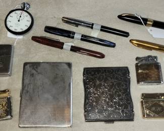 Various vintage cigarette lighter, Sterling silver cigarette cases, and fountain pens, some with 14K gold.
