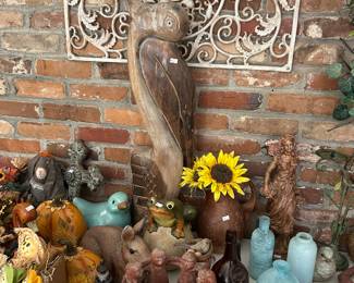 Hand carved pelican, clay figures from Mexico 