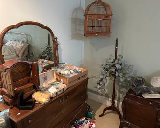 Dresser and jewelry.  Birdcage 