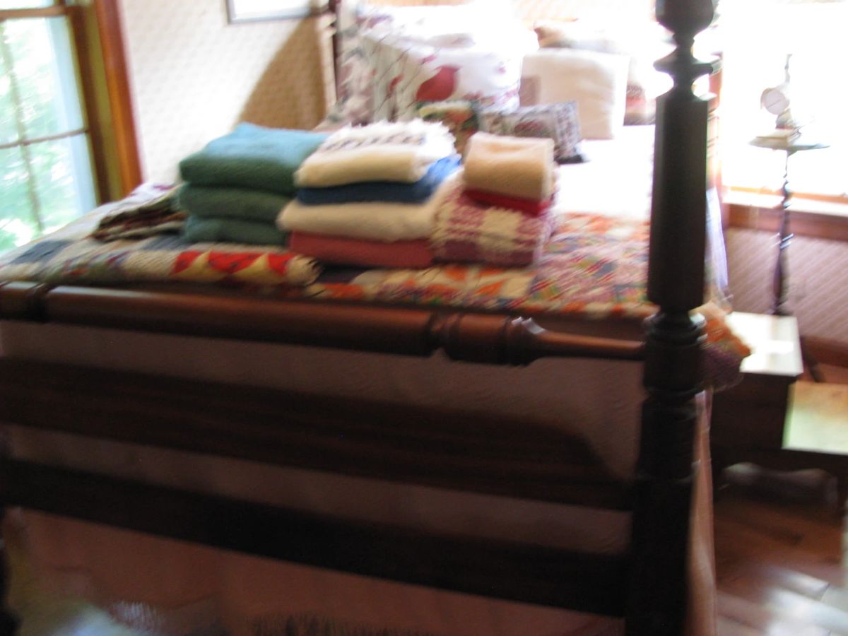 Walnut poster bed made by Clyde Earls