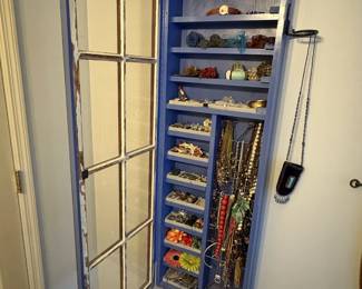 Jewelry cabinet and all the jewelry will be priced separately.