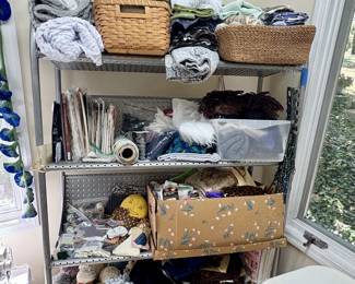 Fabric, patterns, yarn and other sewing items.