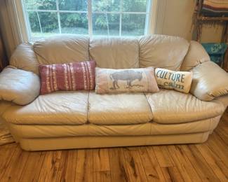 One of the three leather couches (all a set) for sale. 