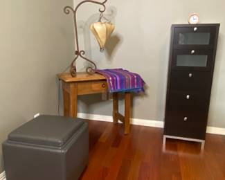 modern high chest with glass fronts, storage ottoman